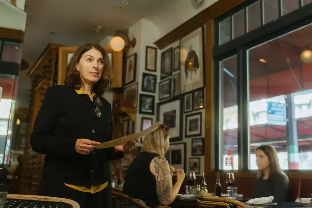 Lidia Valledor at work in North Beach's Cafe Zoetrope